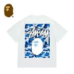 BAPE x STUSSY 聯名款藍迷彩猿人頭印花短袖T恤